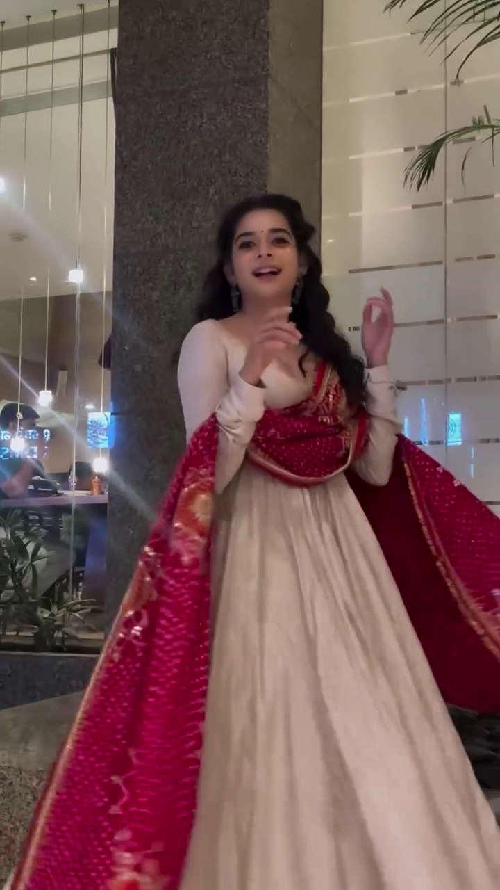 ✨ Royal Ivory Twirl Anarkali Set with Red Bandhej Dupatta – Heritage Festive Edition ✨ A breathtaking fusion of classic elegance and festive richness, crafted for women who love timeless Indian charm. 🤍❤️👑