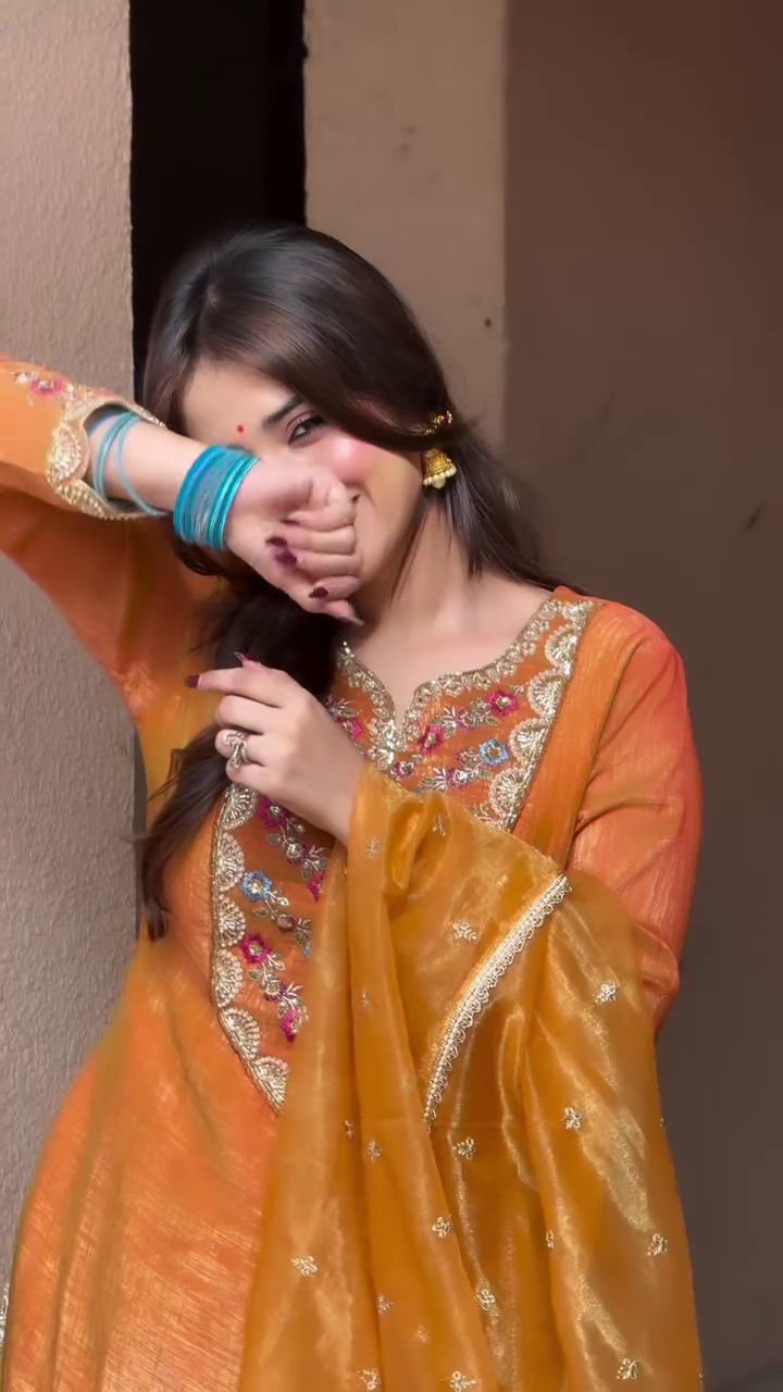 The top is a straight-cut or lightly flared kurta with full, long sleeves. - Image 8