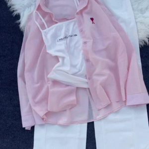 The outfit shown in the image is a three-piece set, featuring a pink button-up shirt, a white camisole top, and wide-leg white pants.